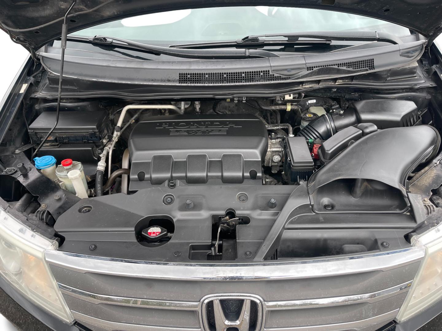 2013 Black /Gray Honda Odyssey EX-L W/ RES (5FNRL5H64DB) with an 3.5L V6 SOHC 24V engine, 5-Speed Automatic transmission, located at 11115 Chardon Rd. , Chardon, OH, 44024, (440) 214-9705, 41.580246, -81.241943 - Photo#11